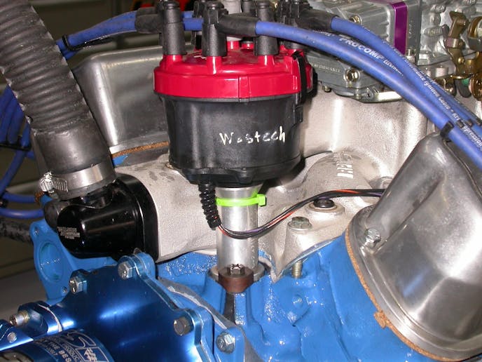 Rather than run a period-correct, dual-point, we installed an MSD billet distributor and Speedmaster plug wires.