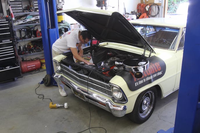The Nova is typical of a nice daily-driven early muscle car. John drives it nearly every day, including taking his kids to school. We started by locating where we wanted the inlet flanges on either side of the radiator.