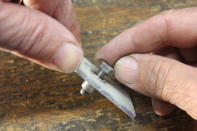 We attached the flanges with simple ¼-inch stainless bolts and nuts, but you could also use threaded inserts.