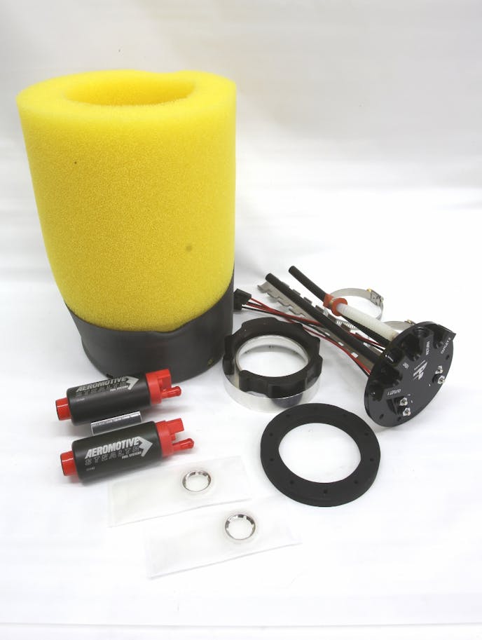 Aeromotive’s Phantom kit is the prototypical kit many of these other systems have emulated. The small black bucket serves as the fuel reservoir, while the yellow cell foam retains the fuel near the pump inlet. Aeromotive offers several size pumps, including this dual 340 lph combination. This dual 340 lph kit can supply a forced induction EFI engine up to 1,400 hp!