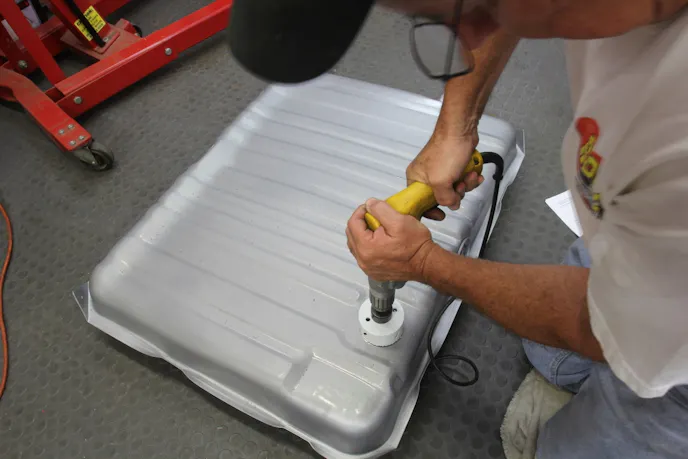 Most pump kits require drilling a large hole in your tank to locate the pump. This early El Camino tank offered a perfect location. If a flat area is not available, most sealing gaskets are designed to accommodate roughly ¼-inch ribbing. If the ribbing is deeper than this, Holley recommends using a Dow Corning fluorosilicone RTV (PN 730) to help seal. Be aware that a 3 oz. tube of this stuff costs $90. Gasoline will not break down this type of RTV, but it will easily dissolve normal silicone.