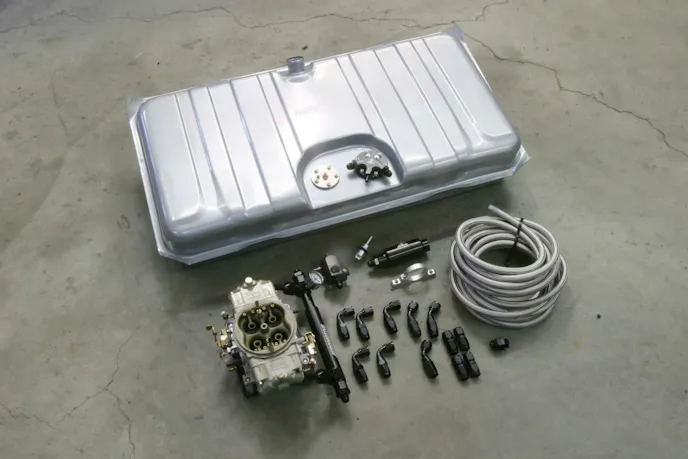 Aeromotive offers a few popular Stealth tank assemblies already converted to an in-tank pump with built-in sump that will feed a carbureted engine up to 1,000 hp. The Aeromotive catalog lists more than 30 different applications. This kit is for an early Camaro. There also is a tank with angled front corners to clear large tail pipes.