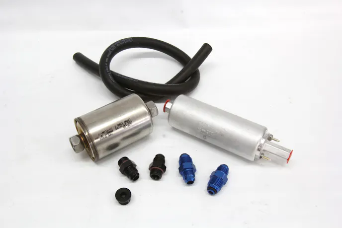 Most EFI companies offer kits like this FAST system using a Bosch external pump, bracket, and fittings. While inexpensive, this is not the best approach. If you choose to run an external pump, place it below the fuel level and as close to the inlet as possible. This could be combined with a Holley HydraMat for a quick EFI pump install, but this would still not be as good as an in-tank application.