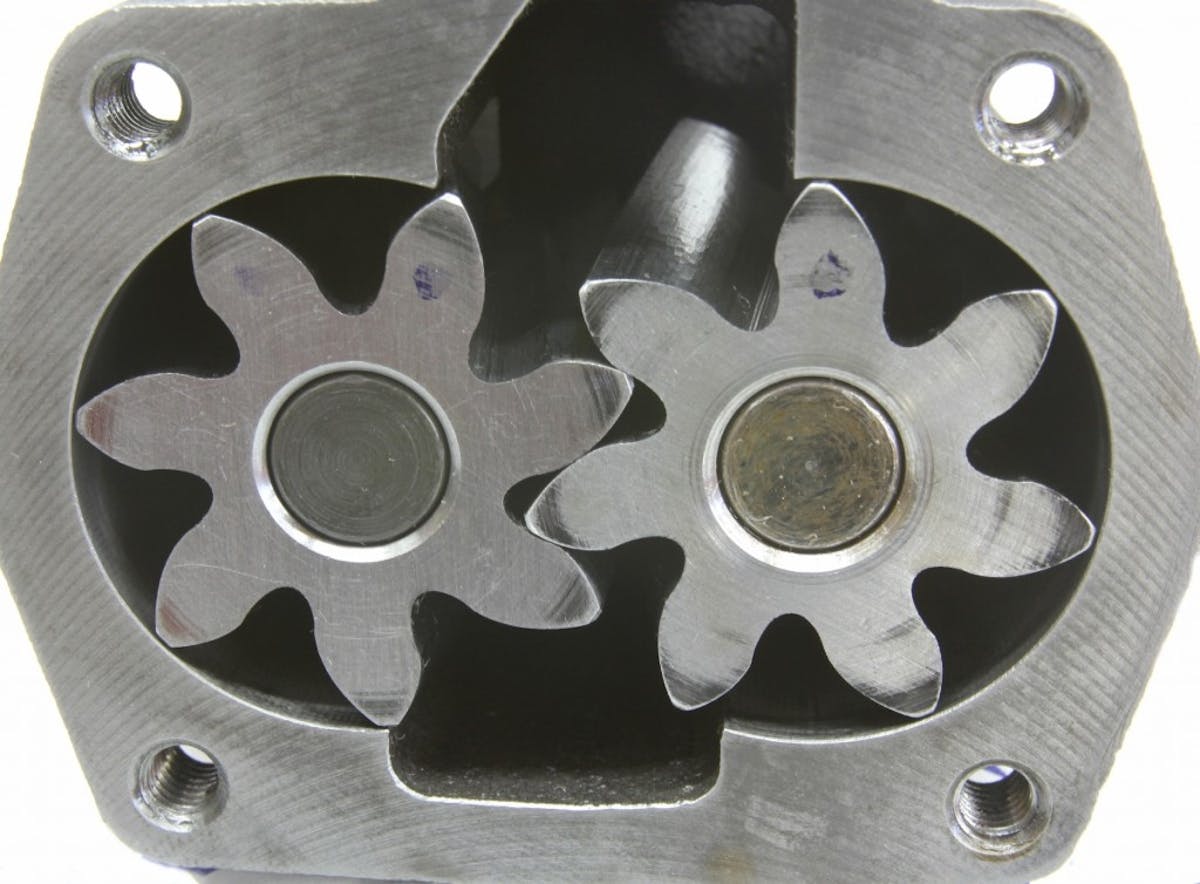 The Shark Tooth design increases the relative gear tip position to the housing that increases volumetric efficiency, which then improves the flow rate.