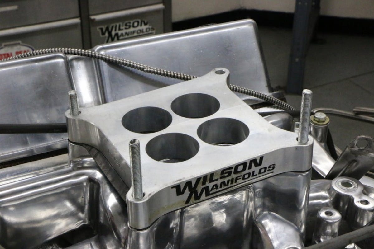 Off came the Wilson open spacer to make room for the 4-hole design.