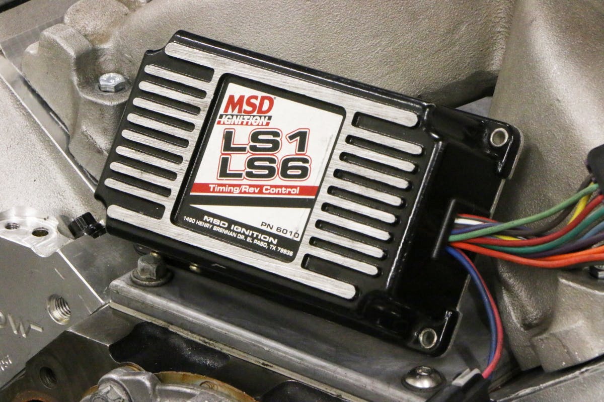 This MSD ignition controller plugged right into the factory sensors and coil packs, allowing us to dial in the desired ignition timing curve for our carbureted LS.