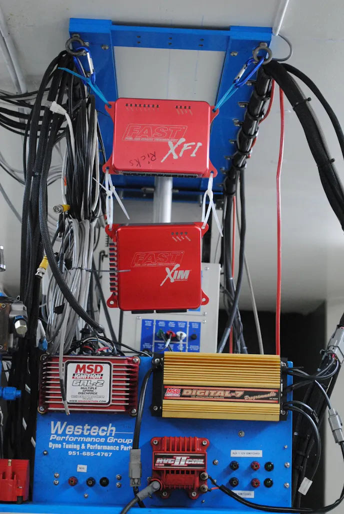 Dialing in the air/fuel and timing curves on the aluminum stroker for our rocker test was this FAST XFI/XIM management system. Consistent air/fuel and timing curves are critical for accurate testing.