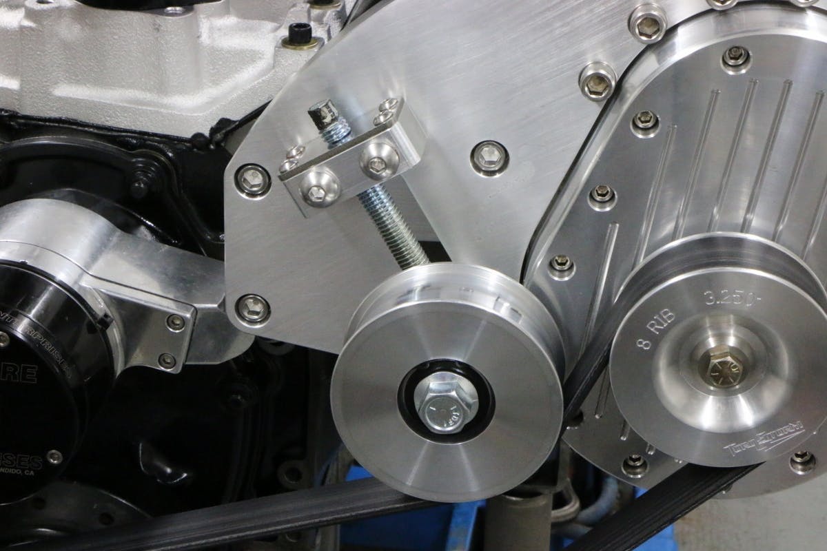 The blower mount featured a dedicated tensioner pulley to tighten the blower belt. Once tightened, we locked it in place using the pulley bolt.