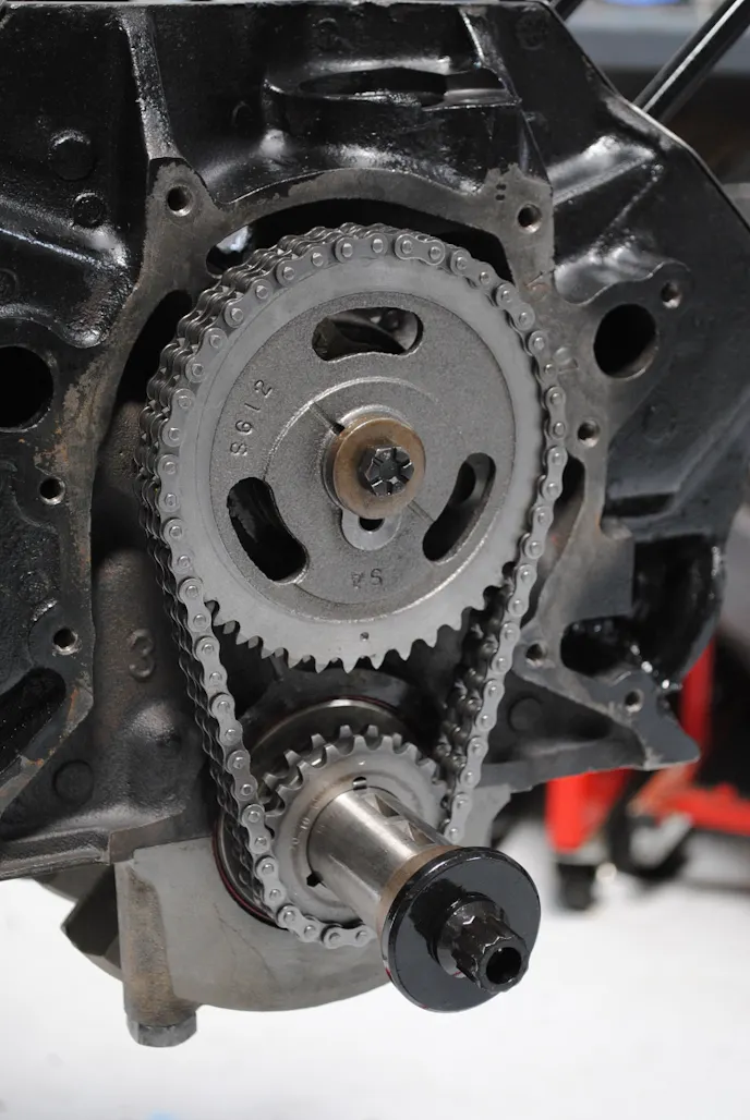 COMP Cams also stepped up with a double-roller timing chain, retro-fit hydraulic roller lifters, and hardened pushrods. Note the ARP damper bolt used to secure our neutral Speedmaster damper.