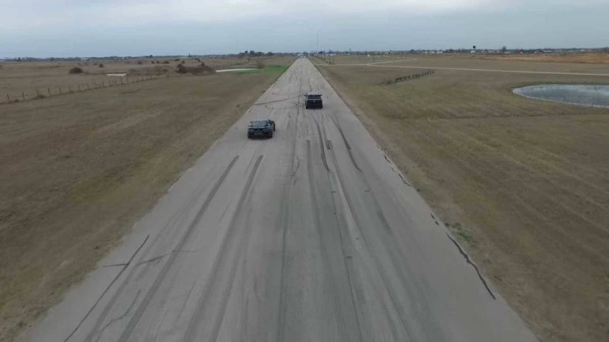 hennessey-escalade-vs-chevy-camaro-zl1