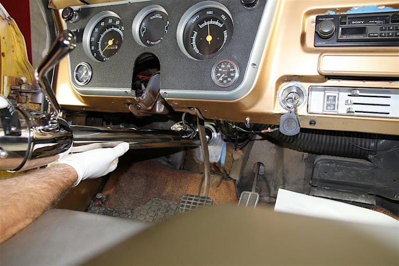 10 - inserting column through floor plate and firewall and aligning with dash