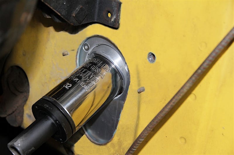 13 - column coming through the firewall into the engine compartment